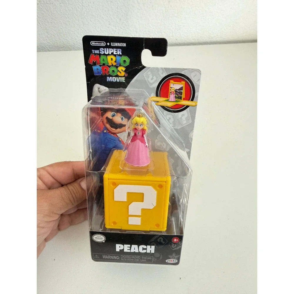 The Super Mario Bros Movie Princess Peach Figure with Question‎ Block